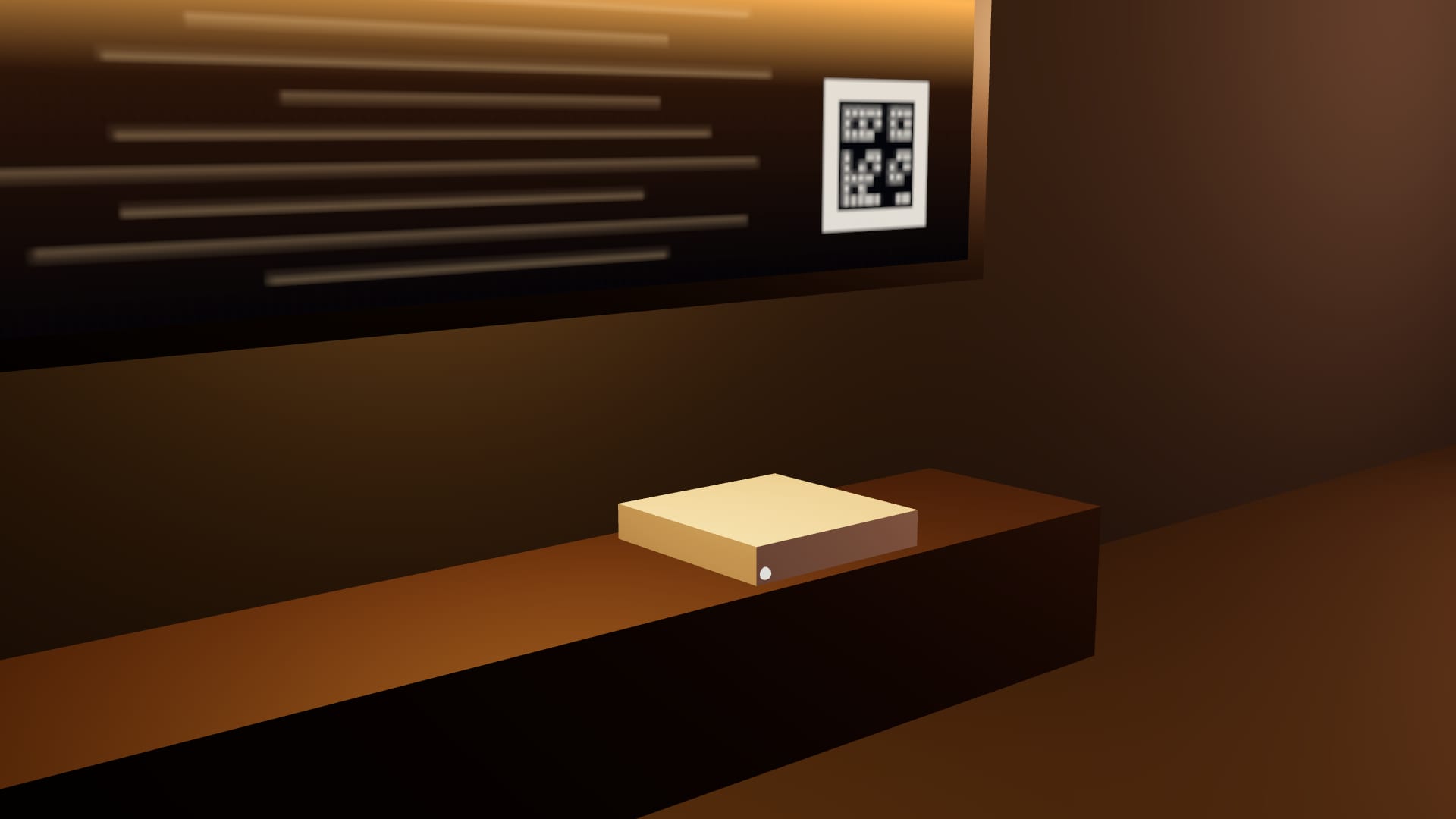 A small box on the console under the television, one light on